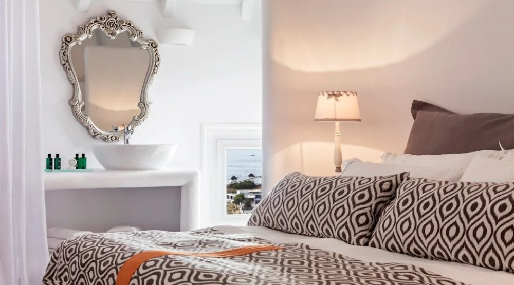 Traditional Windmill Outdoor Jacuzzi at Absolute Mykonos Suites & More