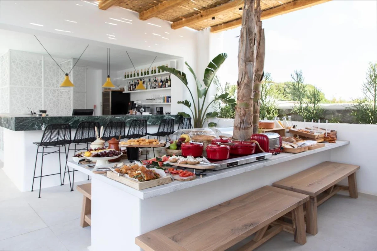 Adorno Beach Hotel & Suites