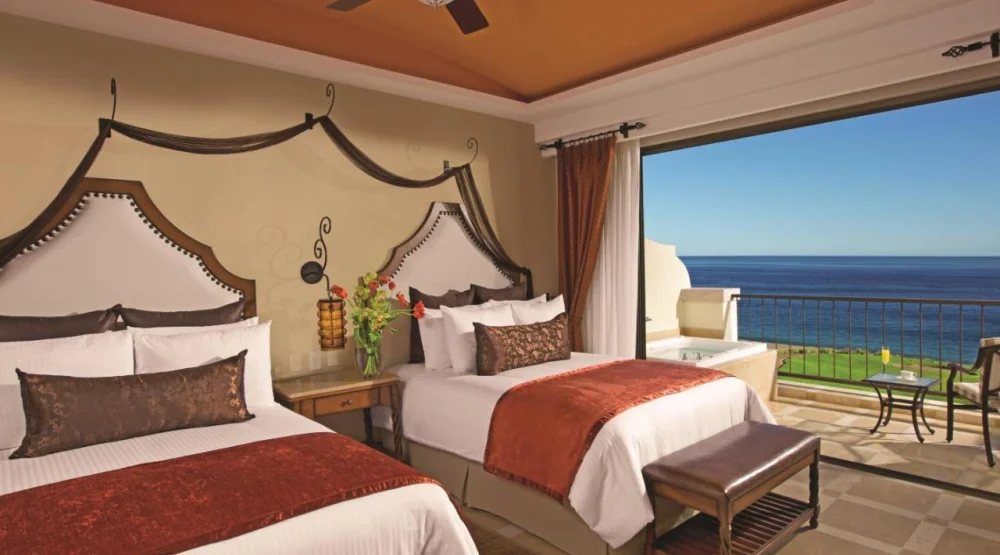 Preferred Club Junior Suite Ocean Front with Two Double Beds at Secrets Puerto Los Cabos Golf & Spa Resort