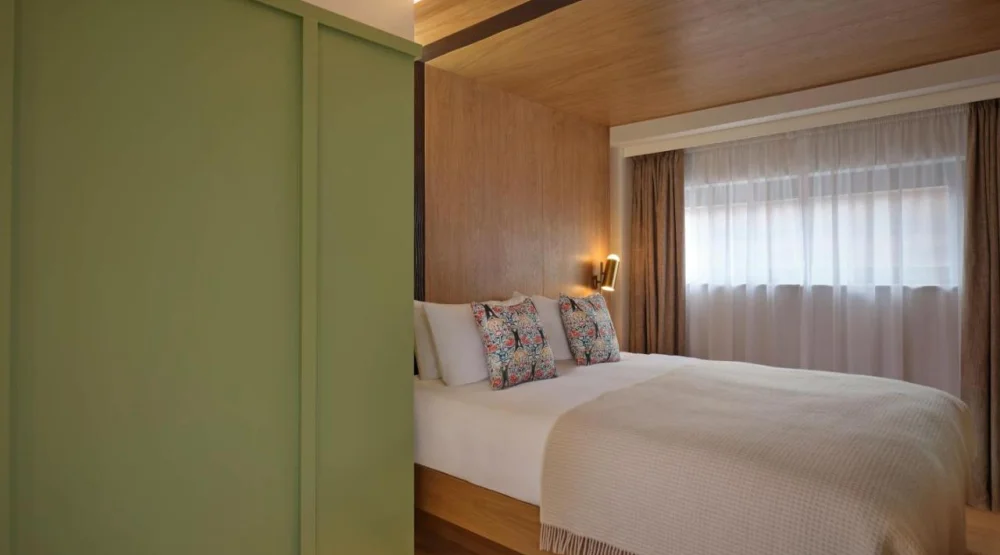 Cozy Queen Room with City View at The Reach at Piccadilly, a Tribute Portfolio Hotel