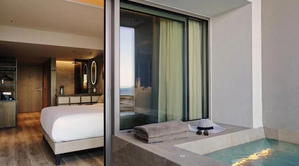 Deluxe Retreat Plunge Pool Atrium View at NIKO Seaside Resort MGallery