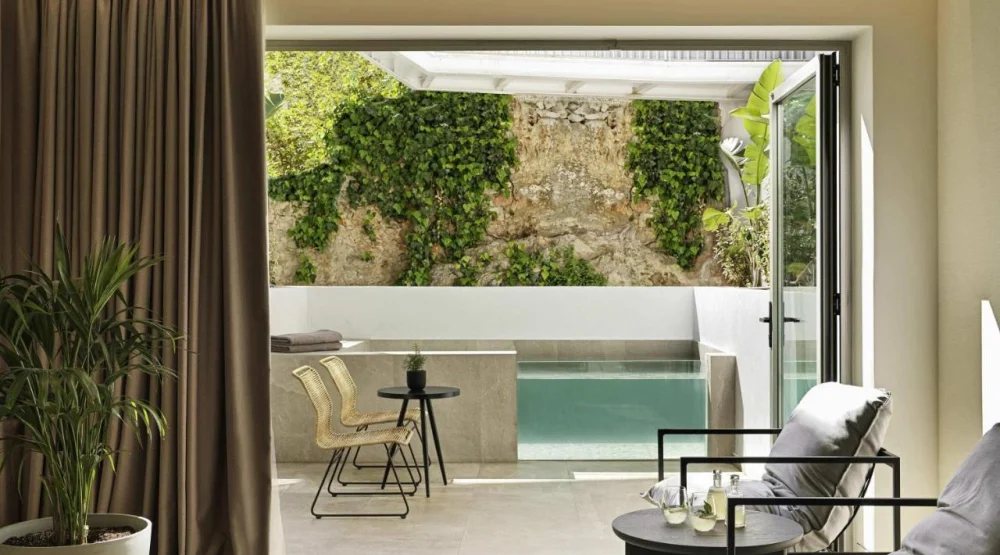 Junior Suite with Plunge Pool and Atrium View at NIKO Seaside Resort MGallery