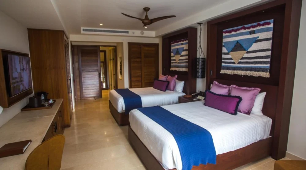 Junior Suite Ocean View with Double Beds (3 Adults) at Secrets Cap Cana Resort & Spa