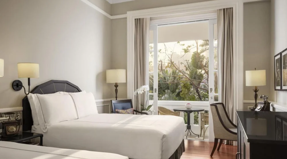 State Twin Room with Pool View at Raffles Hotel Le Royal