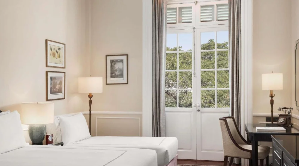 Landmark Twin Room with Pool View at Raffles Hotel Le Royal