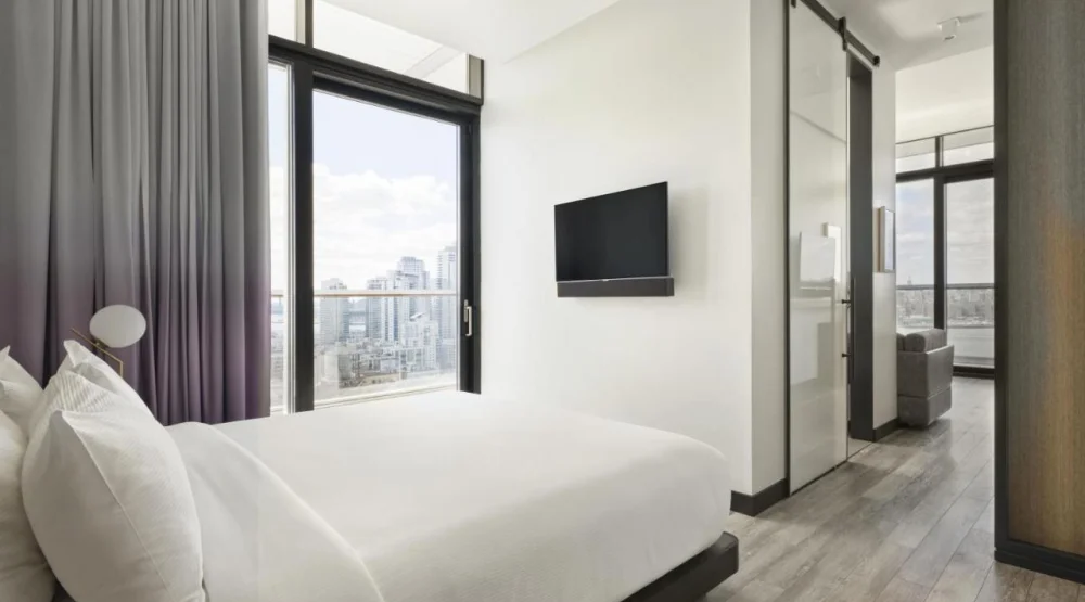 Deluxe Corner Suite with Wraparound Balcony at The William Vale