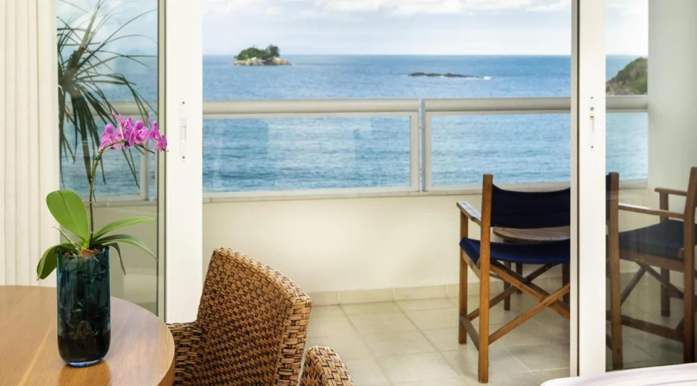 Quarto Deluxe Com Cama De Casal E Varanda - Vista Mar at Hotel Jequitimar Guaruja Resort & Spa