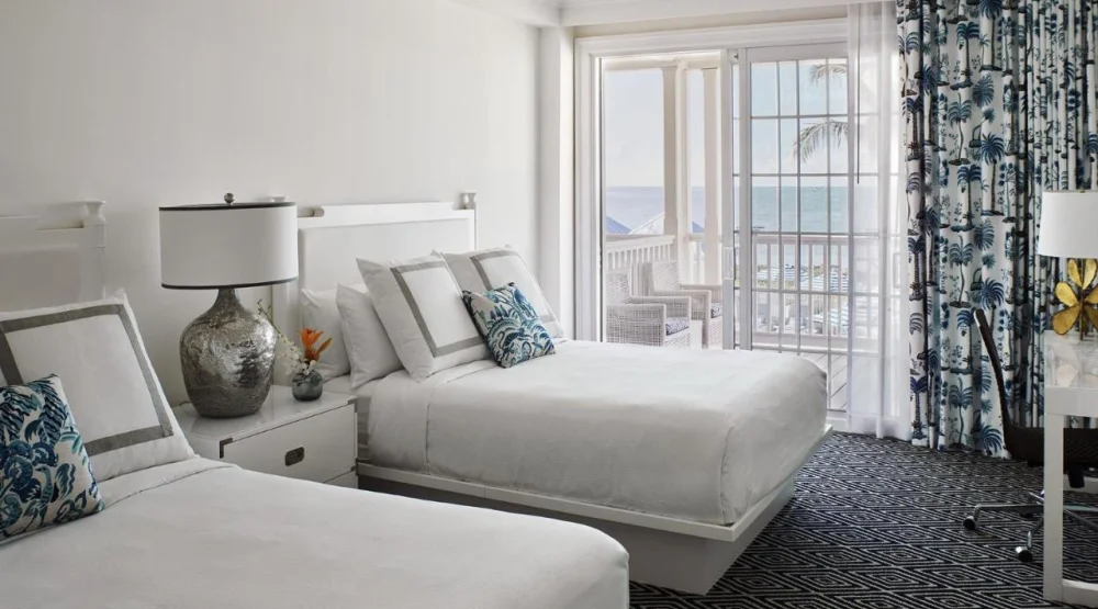 Oceanfront Balcony Two Bedroom Guestroom, Two Queens Primary/one King Room at Isla Bella Beach Resort