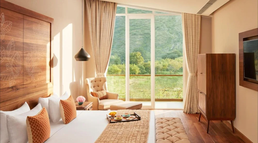 Deluxe Hill View Room with Balcony Twin Bed at Taj Aravali Resort & Spa