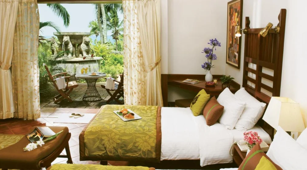 Superior Cottages Garden View Twin Bed at Taj Green Cove Resort & Spa Thiruvanthapuram