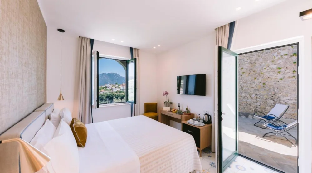 Deluxe Double Room with Terrace & Partial Sea View at Palazzo Pascal