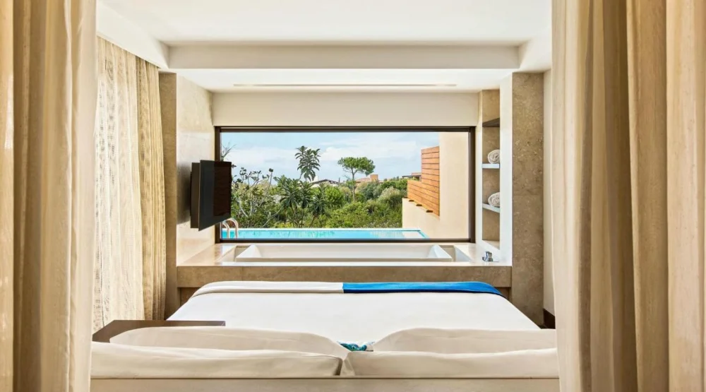 Grand Infinity Suite King Garden View at The Romanos, a Luxury Collection Resort